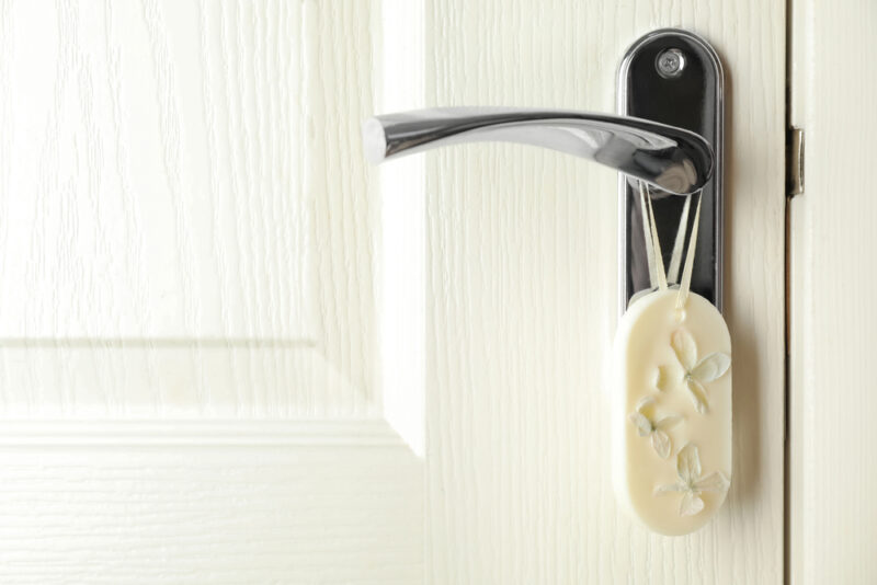 Chrome door handle with floral sachet